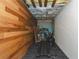 Basement area with wood paneling, a treadmill, and storage space at 275 Fern Crest Dr, Lawrenceville, GA 30046