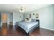 Comfortable bedroom with hardwood floors, soft blue walls and plenty of space at 275 Fern Crest Dr, Lawrenceville, GA 30046