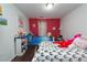 Cozy bedroom with two twin beds, hardwood floors and decorated with stuffed animals at 275 Fern Crest Dr, Lawrenceville, GA 30046
