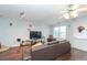 Comfortable living room with hardwood floors, light walls, and a cozy atmosphere at 275 Fern Crest Dr, Lawrenceville, GA 30046