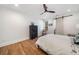 room has a sliding barn door, hardwood floors, playful decor and plenty of natural light at 3920 Maybreeze Rd, Marietta, GA 30066