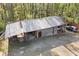 Outbuilding showcasing ample storage space and parking, ideal for hobbies or additional vehicles at 3920 Maybreeze Rd, Marietta, GA 30066