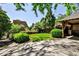 A view of the beautifully manicured lawn in the backyard, surrounded by mature trees and landscaping, providing a peaceful retreat at 272 Rumson Ne Rd, Atlanta, GA 30305
