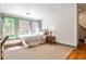 Bright bedroom with large windows offering beautiful views and hardwood floors at 272 Rumson Ne Rd, Atlanta, GA 30305