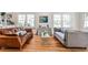 Open-concept living room with hardwood floors and ample natural light, perfect for gatherings and relaxation at 272 Rumson Ne Rd, Atlanta, GA 30305