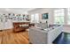 Bright living room featuring hardwood floors, built-in bookshelves, and comfortable seating for relaxing and entertaining at 272 Rumson Ne Rd, Atlanta, GA 30305