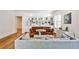 Cozy living room with built-in shelving, hardwood floors, and comfortable seating, ideal for relaxing with Gathering at 272 Rumson Ne Rd, Atlanta, GA 30305