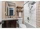 Cozy bathroom featuring tub, granite counters, and modern fixtures at 3048 Cottonwood Se Dr, Atlanta, GA 30316