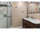 Updated bathroom with walk-in shower, modern vanity, and sleek fixtures at 3048 Cottonwood Se Dr, Atlanta, GA 30316