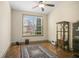 Bonus room featuring a ceiling fan and hardwood floors at 3739 Union Park Dr, Duluth, GA 30097