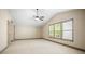 Spacious bonus room with neutral carpet, vaulted ceiling, and great natural light at 3739 Union Park Dr, Duluth, GA 30097