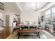 Spacious dining room with hardwood floors, stylish table with chairs, and a decorative chandelier, great for gatherings at 3739 Union Park Dr, Duluth, GA 30097