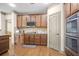 Beautiful kitchen features a suite of stainless appliances and granite countertops with generous cabinet space at 3739 Union Park Dr, Duluth, GA 30097