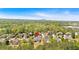 Beautiful aerial view of a wooded neighborhood with a house marked at 541 Lombard St, Marietta, GA 30064