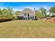 A well-maintained lawn and patio create an ideal setting for outdoor living and entertainment at 541 Lombard St, Marietta, GA 30064