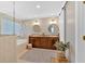 Luxurious bathroom featuring double vanity, soaking tub, and glass shower at 541 Lombard St, Marietta, GA 30064