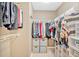 Walk-in closet features built-in shelving and ample storage space for clothes and accessories at 541 Lombard St, Marietta, GA 30064