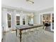 Inviting dining room with natural light, wooden table, and seating for six at 541 Lombard St, Marietta, GA 30064