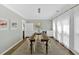 Elegant dining room with a long table, stylish chairs, and ample natural light at 541 Lombard St, Marietta, GA 30064