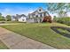 Beautiful two-story home featuring a three-car garage, a welcoming porch, and a meticulously maintained lawn at 541 Lombard St, Marietta, GA 30064