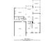 Detailed floor plan of a home's first level, outlining the kitchen, living spaces, and garage layout at 541 Lombard St, Marietta, GA 30064