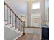 Grand foyer with hardwood floors, staircase, and natural light, creating an inviting entrance at 541 Lombard St, Marietta, GA 30064
