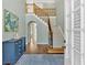 Elegant foyer with hardwood floors, staircase, and view into other rooms at 541 Lombard St, Marietta, GA 30064