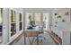 Bright home office with a modern desk, ample storage, and natural light from large windows at 541 Lombard St, Marietta, GA 30064