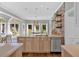 Bright and airy kitchen with a double sink island, stainless appliances, and outdoor views at 541 Lombard St, Marietta, GA 30064