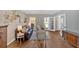 Bright living room featuring hardwood floors, a comfortable sofa, and stylish decor at 541 Lombard St, Marietta, GA 30064