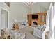 Bright living room with fireplace, and vaulted ceilings is perfect for relaxing and entertaining guests at 541 Lombard St, Marietta, GA 30064