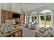 Bright and airy living room with large windows, fireplace, and comfortable seating arrangements at 541 Lombard St, Marietta, GA 30064