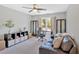 Home office with comfortable seating, storage shelves, and a large window for natural light at 541 Lombard St, Marietta, GA 30064
