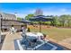 Outdoor patio featuring patio furniture, umbrellas and grill, perfect for outdoor entertaining in backyard at 541 Lombard St, Marietta, GA 30064