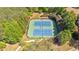 Aerial view of well-maintained community tennis courts surrounded by lush greenery at 541 Lombard St, Marietta, GA 30064