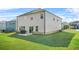 Beautiful backyard featuring a patio and a lush green lawn at 802 Milo Bay St, Loganville, GA 30052