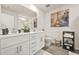 Modern bathroom featuring a double vanity, sleek fixtures, and tiled floor at 802 Milo Bay St, Loganville, GA 30052
