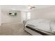 Spacious bedroom featuring plush carpeting and tv at 802 Milo Bay St, Loganville, GA 30052