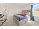 Comfortable bedroom with a queen-sized bed and a connected bathroom at 802 Milo Bay St, Loganville, GA 30052