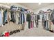 Large walk-in closet with ample storage space and organization features at 802 Milo Bay St, Loganville, GA 30052