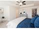 Bright main bedroom features tray ceilings, ceiling fan, sitting area and en suite bathroom at 2680 Ne Almand Lane Ne, Conyers, GA 30013