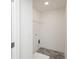 Efficient laundry room featuring neutral paint, tiled floor, and shelving at 2680 Ne Almand Ne Ln, Conyers, GA 30013