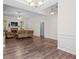 Spacious living room features a fireplace, hardwood floors and ample natural light at 5071 Woodmont Dr, Villa Rica, GA 30180