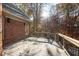 Spacious wooden back deck surrounded by trees at 13230 Addison Rd, Roswell, GA 30075