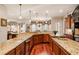 Beautiful kitchen featuring granite counters, custom cabinets, stainless appliances and hardwood floors at 13230 Addison Rd, Roswell, GA 30075