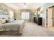 Serene main bedroom featuring a plush bed, plantation shutters, and elegant decor, creating a restful sanctuary at 13230 Addison Rd, Roswell, GA 30075