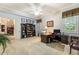 Bright office with neutral carpet, ceiling fan, and plenty of natural light at 13230 Addison Rd, Roswell, GA 30075