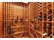 View of custom wine cellar with wooden racks and bottle storage, ready for wine enthusiasts at 13230 Addison Rd, Roswell, GA 30075