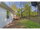 Backyard view with wooden deck and trees at 1346 Wichita Sw Dr, Atlanta, GA 30311