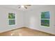 Bedroom with hardwood floors and natural light streaming through the windows at 1346 Wichita Sw Dr, Atlanta, GA 30311